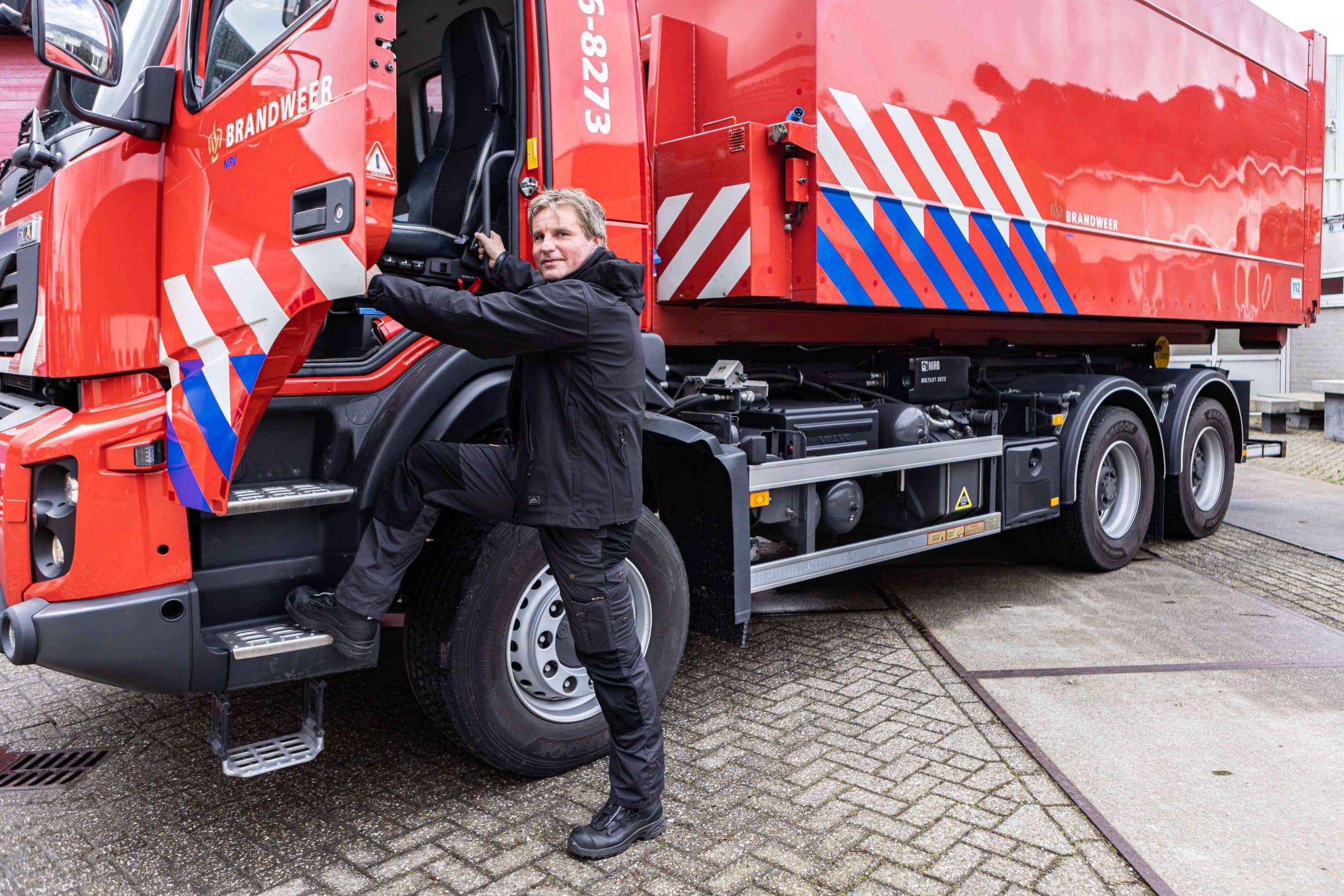 Collega Marco bij truck